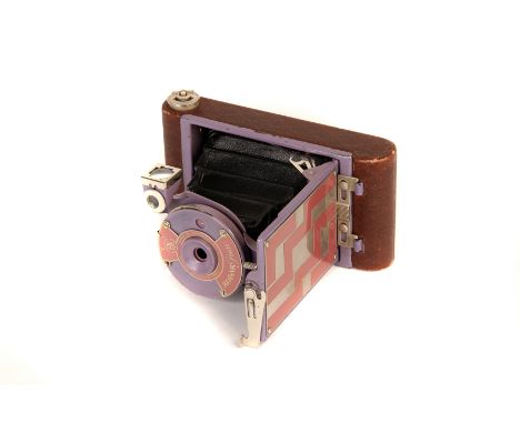 A Kodak Petite Vest Pocket Camera, pink step pattern, body, G, lens, G-VG, shutter working, some light fungus