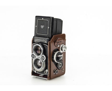 A Rolleiflex 3.5F TLR Camera, black, serial no. 2230419, with Carl Zeiss Planar f/3.5 75mm lens, serial no. 2930392, body, G,