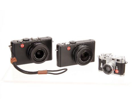 A Leica D-Lux 4 Digital Camera, together with a Leica D-Lux 3, both in maker’s cases and boxes, together with a Minox digital