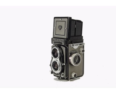 A Rolleiflex 3.5 T TLR Camera, grey, serial no. 2101025, with Carl Zeiss Tessar f/3.5 75mm, serial no. 1678776, body, G-VG, s