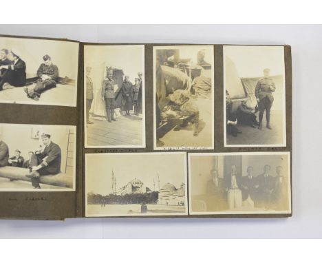 A Silver-Print Snapshot Album, titled Lieut. Commr. E L Hill R N, May 1913-1928, including HMS Marlborough in Black Sea in 19