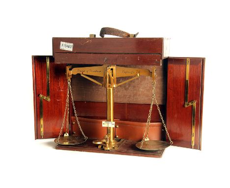 A pair of early 20th Century lacquered brass 7lb Portable Scales for Borough of Grantham, in mahogany travelling case with sh