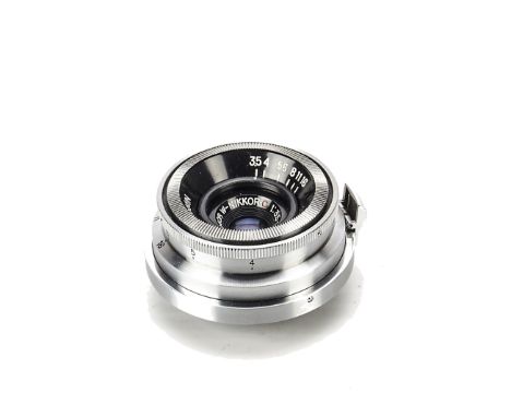A Nikon W-Nikkor.C f/3.5 35mm Lens, chrome, serial no. 429408, body, VG, elements, G-VG, some light marks to rear element