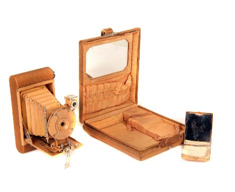 A Kodak Petie Vest Pocket Vanity Set, beige, body, VG, lens, G, shutter working, some fungus, in vanity case with unused powd