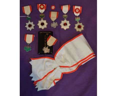 Japan, Order of the Rising Sun, miscellaneous insignia (7), Fourth Class breast badges (2), in silver-gilt and enamels, Sixth