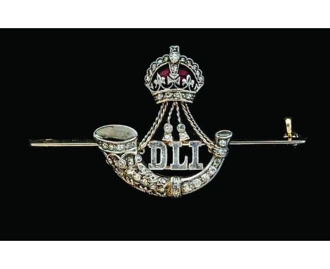 Durham Light Infantry, by the Goldsmiths and Silversmiths Company, in gold, red enamel and diamonds set with diamonds, in ori