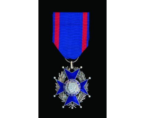 France, National Order of Labour, 1942, for 10 Years’ Service, Knight’s breast badge in silver and enamels, with portrait of 