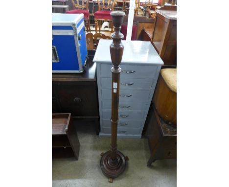 A mahogany standard lamp 