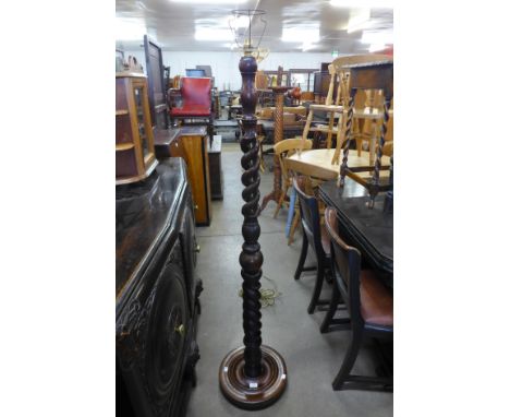 An oak barleytwist floor standing lamp 