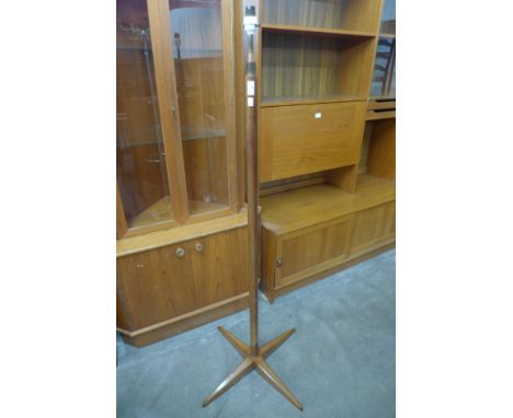 A teak standard lamp 