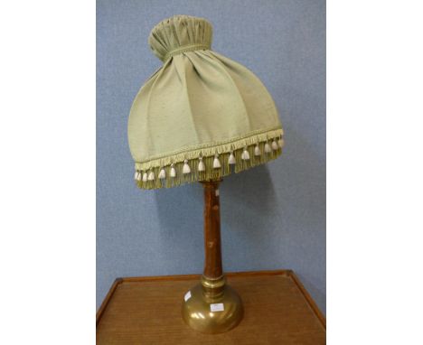 A copper and brass table lamp 