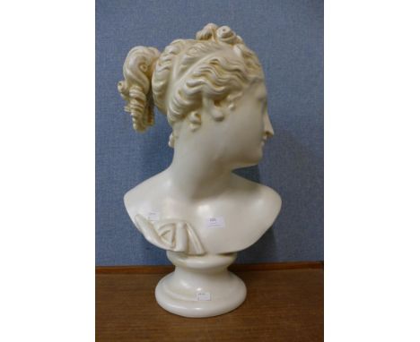 A ceramic bust of a lady 