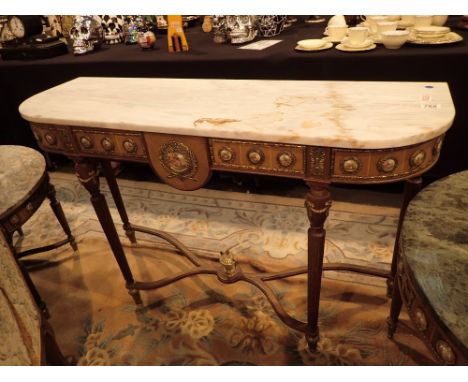 Marble top console table with brass detail decorated with Limoges ceramic plaques CONDITION REPORT: There is staining to the 