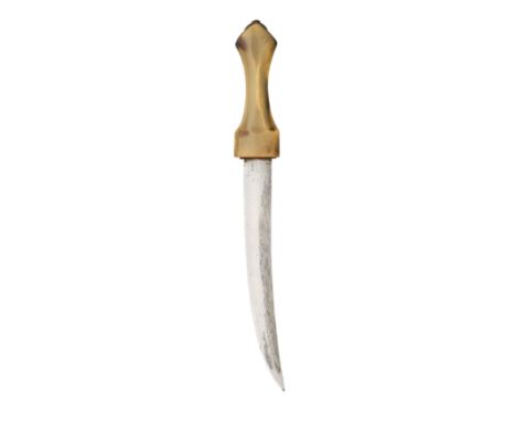 ˜AN INDIAN DAGGER (JAMBIYA) WITH RHINOCEROS HORN HILT, 19TH CENTURY with slightly curved double-edged blade of flattened-diam