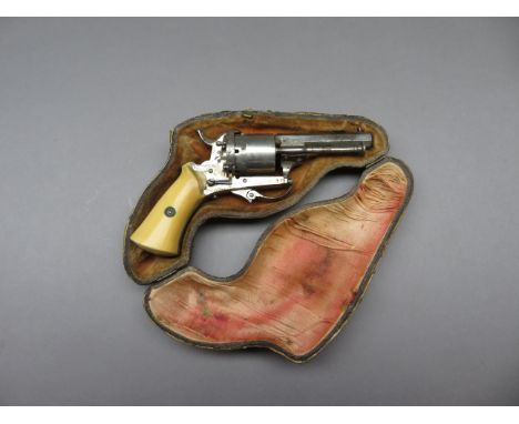 A 6MM CASED PIN FIRE SIX-SHOT REVOLVER, CIRCA 1880 with octagonal sighted barrel, plain frame and cylinder, folding trigger, 