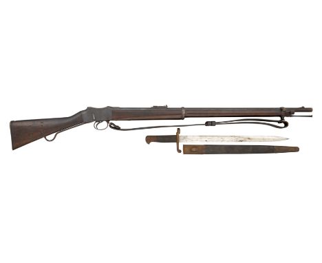 A .577/450 CALIBRE MARTINI HENRY MARK IV RIFLE, DATED 1886 of regulation type, with sighted barrel retained by two bands, fit