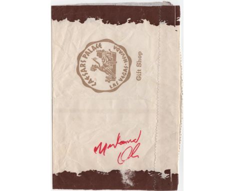 ALI MUHAMMAD: (1942-2016) American Boxer, World Heavyweight Champion. Bold red ink signature ('Muhammad Ali') to a clear area