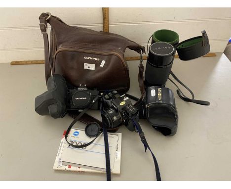 Mixed Lot: Camera equipment comprising an Olympus OM1 camera with lenses and various accessories together with a Minolta 7000