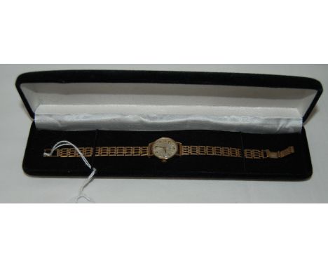 Ladies mid century Tissot wrist watch in a 9ct gold case with 9ct gold bracelet.