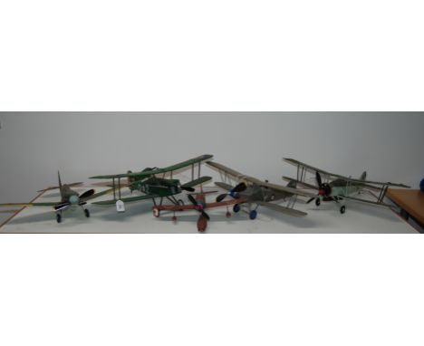 Models of a bi plane, Seafire , Japanese float plane, a Fairy swordfish torpedo bomber and 1 other.