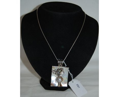 Arts and crafts large silver mother of pearl pendant & chain set with a single pearl.