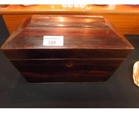 Twin section tea caddy sarcophygus form