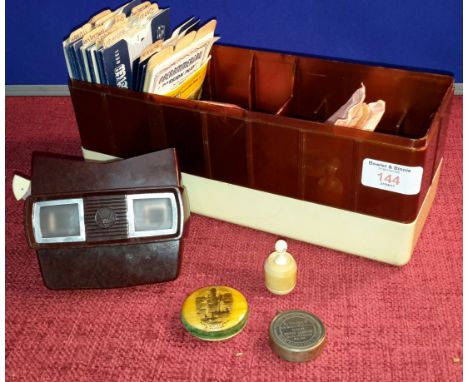 Peep eye viewer of 'The Memory of Edinburgh' in the shape of small barrel, Bakelite view master with view cards, Mauchlin pin