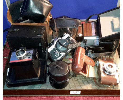 Tray of camera equipment to include, Poloroid colour pack 80 & Olympus camera 