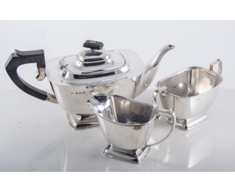 Four piece silver teaset, Birmingham 1939, rectangular tapering bodies, comprising of teapot, hot water jug, sugar and milk, 
