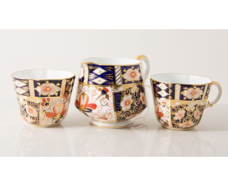 Royal Crown Derby, witches pattern, eight coffee cups, saucers and cream jug.