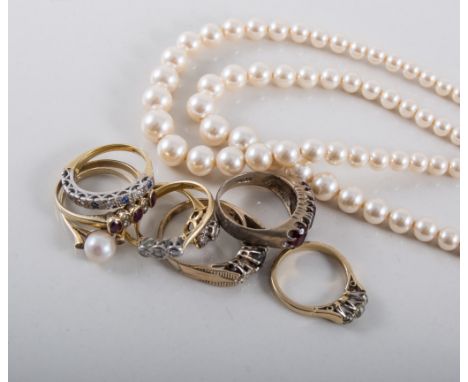 Seven gold rings, 9 and 18 carat set with a cultured pearl, diamonds, sapphires, etc, gross weight including stones 21gms, a 