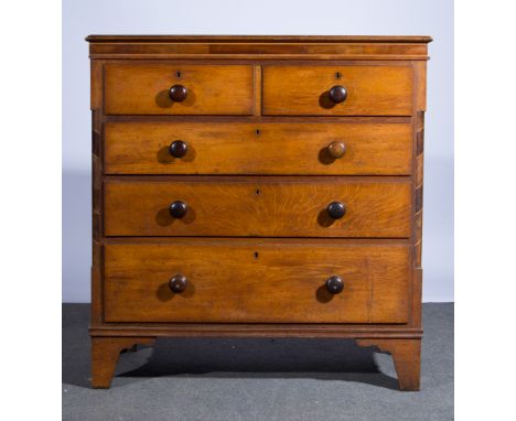 Victorian oak chest of drawers, rectangular top with moulded edge, two short and three long, graduating drawers with turned h