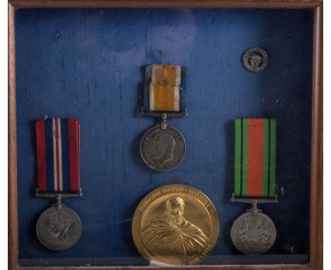 Medals: British War medal 1914-18, awarded to Rev. G. J. Johnson, a British War Medal 1939-1945, Defence Medal and gilt medal