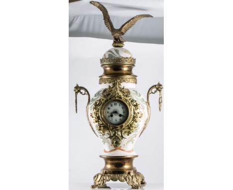 Large Continental baluster shaped table clock, with ormolu and brass appliques and scrolled base and eagle surmount, overall 