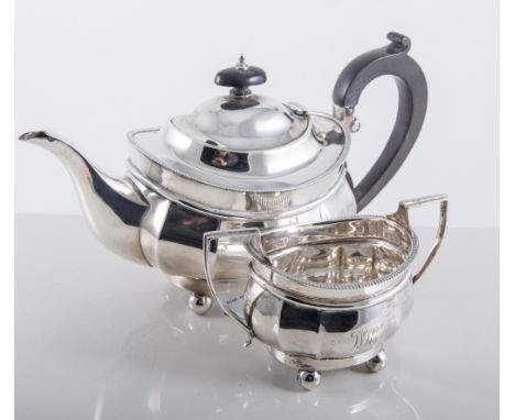 Silver three-piece teaset, ovoid form, beaded outlines, raised on four ball feet, by Mappin & Webb, Birmingham 1942, comprisi