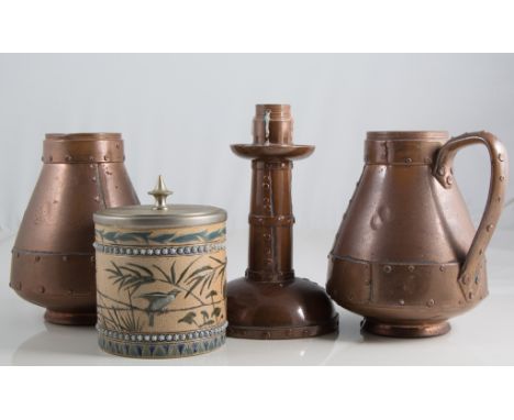 Doulton Lambeth, three Silicon ware items, two hob-nail copper effect pitchers and similar candlestick (two damaged); a Flore