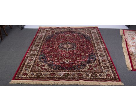 Red ground Kashmir rug, medallion design, floral field, approx 240cm x 160cm