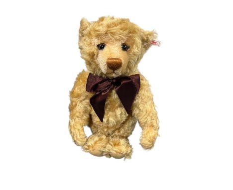 Steiff. Millennium Teddy Bear, white tag no. 670374, limited edition certificate no. 8556 and production 1999 only, excellent