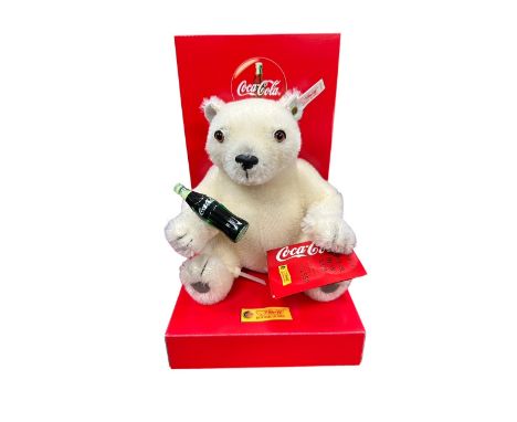 Steiff. Coca Cola Polar Bear Cub, white tag no. 666032, excellent in excellent to good plus box, limited edition certificate 