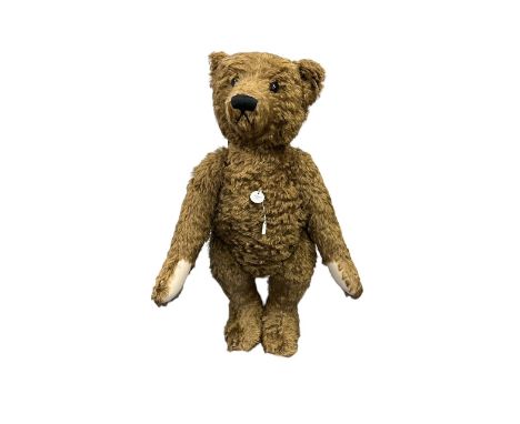 Steiff. 1993 replica of 1907 Teddy Bear, white tag no. 406010, limited edition certificate 1111 of 5000, large dark brown moh