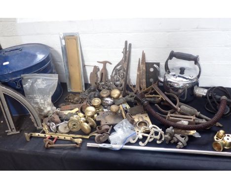 A COLLECTION OF IRONMONGERY handles, iron brackets, window stays, ceiling hooks etc, with a speaking tube terminal, a vintage