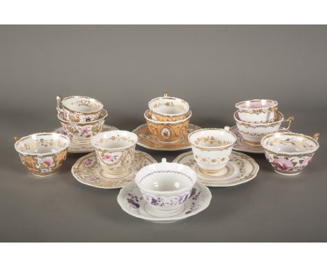 A COLLECTION OF YATES OAK AND MISTLETOE SHAPE TEAWARE comprising three trios, three cups and saucers and two teacups, decorat