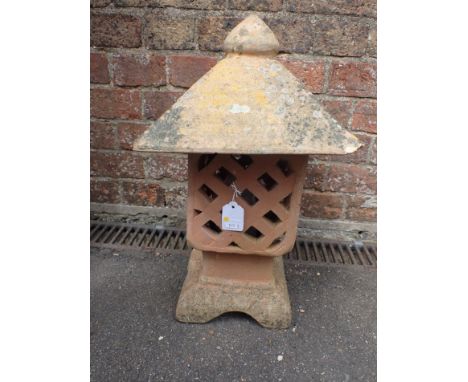 A CHINESE STYLE TERRACOTTA GARDEN LANTERN with lattice sides and lift-off pyramidal top 47cm high