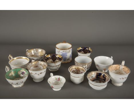 A MIXED COLLECTION OF ENGLISH PORCELAIN TEA AND COFFEE CUPS all lacking saucers, including a mug, probably by H &amp; R Danie