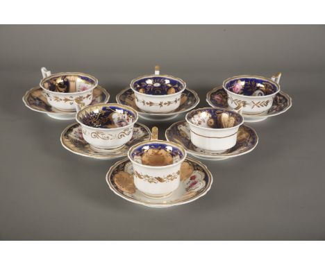 A COLLECTION OF YATES 'OLD ENGLISH' SHAPE TEAWARES comprising six cups and saucers, variously decorated in patterns of blue a