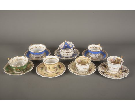 A COLLECTION OF YATES OAK AND MISTLETOE SHAPE TEAWARE comprising a trio and six cups and saucers, decorated throughout in var