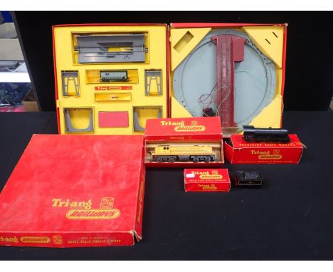 TRI-ANG RAILWAY ITEMS: ORE WAGON SET R.135, Turntable R.408, 4-6-0 loco R150, and tender, and  R155 diesel switcher, boxed (w