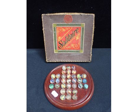 A VINTAGE SOLITAIRE SET  WITH VARIOUS ANTIQUE MARBLES (mismatched, some damaged) by R. Turner Ltd (retailed by Bragg's  Dorch