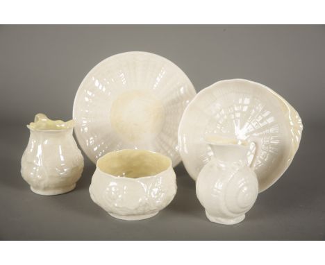 A SMALL COLLECTION OF BELLEEK all marked, including two small jugs, the tallest 9cm high. two saucers, and a bowl, 5cm high (