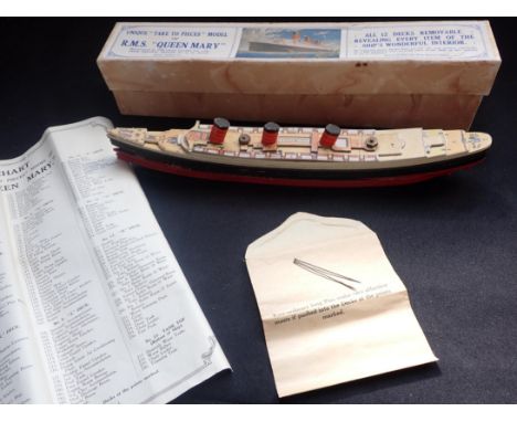 A CHAD VALLEY 'AKE TO PIECES' MODEL OF R.M.S. 'QUEEN MARY' boxed, with key chart and envelope containing two pins (for masts)